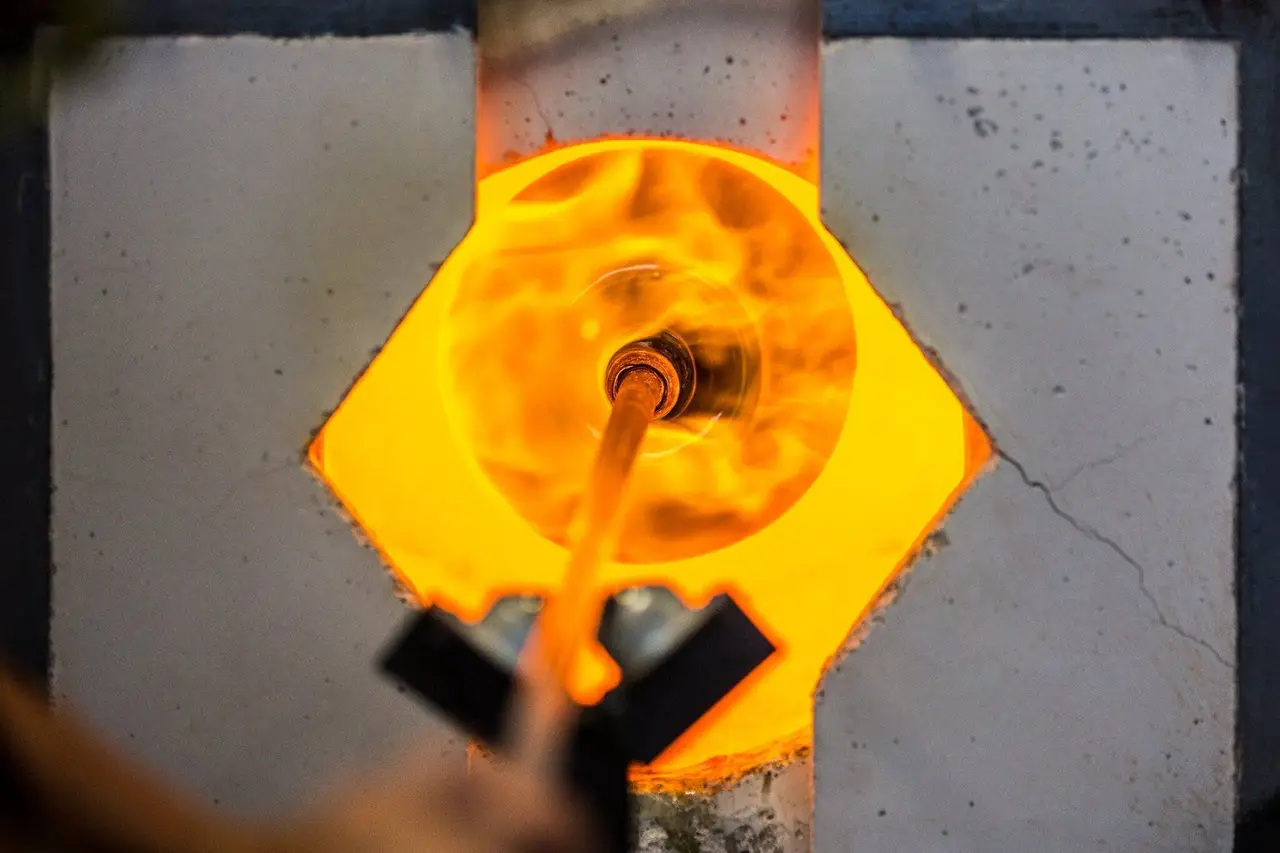 A large bowl reheating in the mouth of the glory hole