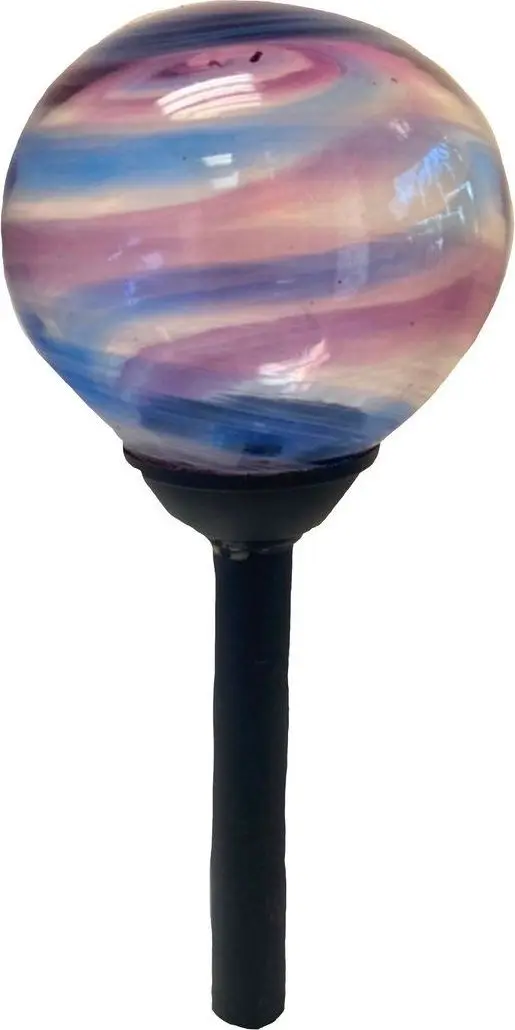 Pink and blue swirled globe on a garden stake
