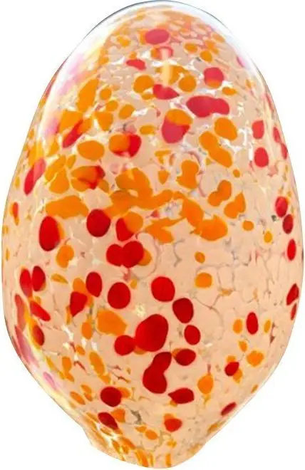 White egg speckled with orange and red